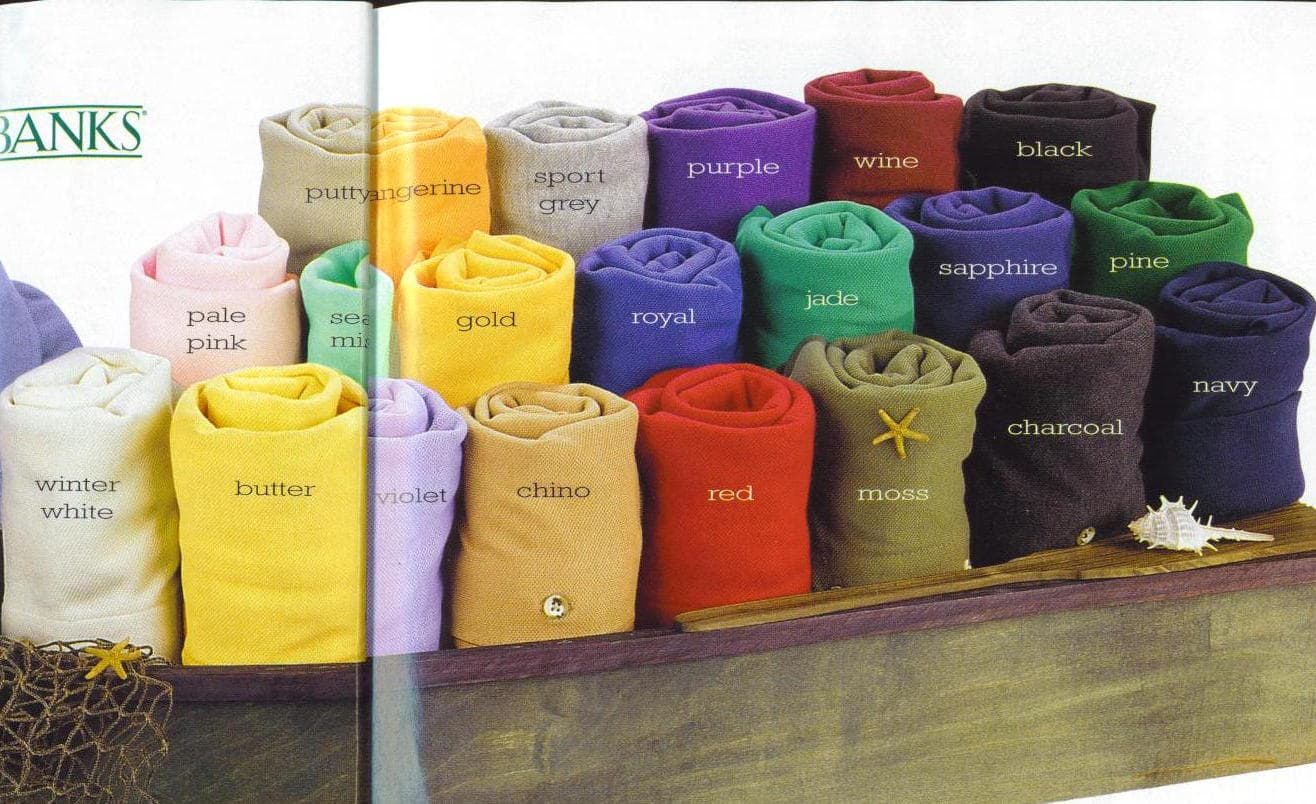 Colorful knit fabric samples arranged in overlapping rows